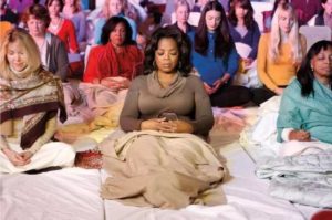 Oprah Winfrey doing Yoga