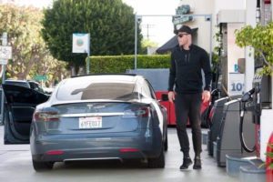 Blake Griffin with his Tesla