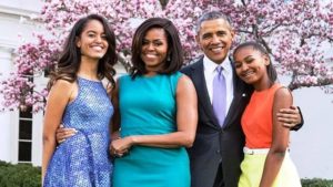 Michelle Obama with her children and husband