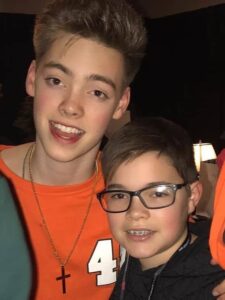 Zach Herron with his brother