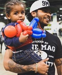 Ryan Henry with his son