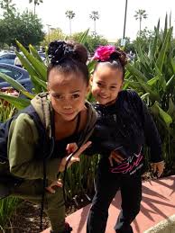 Asia Monet Ray with her sister