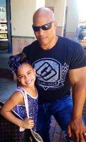 Asia Monet Ray with her father