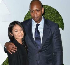Dave Chappelle with his wife