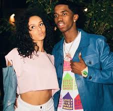 Christian Combs with his girlfriend