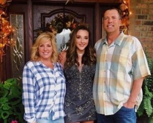 Kendall Vertes with her parents