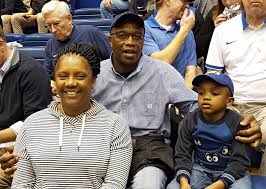 Zion Williamson with his parents
