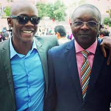 Israel Adesanya with his father