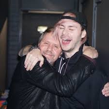 Michael Clifford with his father