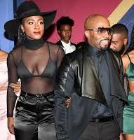 Teddy Riley with his wife