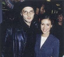 Alyssa Milano with her ex-husband Cinjun 