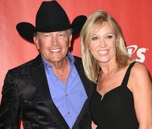 George Strait with his wife