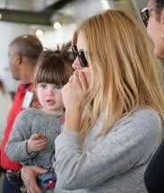 Sienna Miller with her daughter