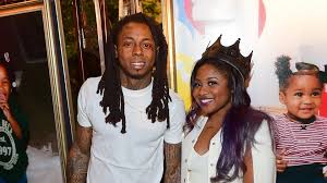 Reginae Carter with her father
