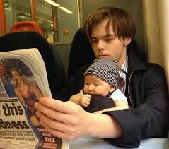 Charlie Heaton with his son