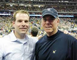 Roger Staubach with his son