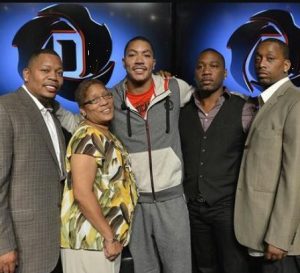 Derrick Rose with his mother & brothers