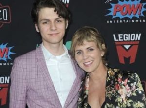 Ty Simpkins with his mother