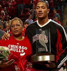 Derrick Rose with his mother