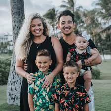 Josiah Capaci with his wife & kids