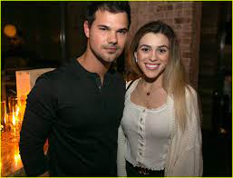 Taylor Lautner with his girlfriend Taylor Dome