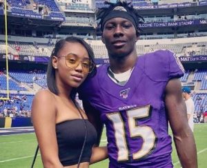 Marquise Brown with his girlfriend