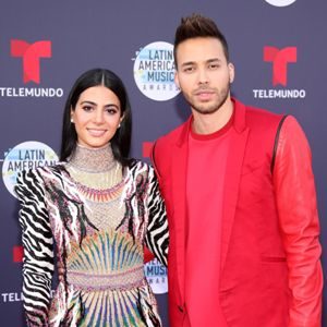 Prince Royce with his wife