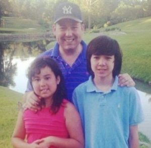 Ed Henry with his children