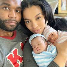 Myron Rolle with his wife & kids