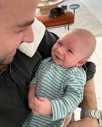 Taylor Goldsmith with his son