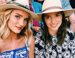 Rosie Huntington-Whiteley with her sister