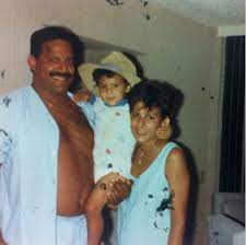Aaron Hernandez with his parents