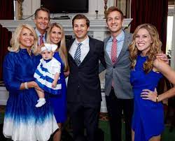 Cris Collinsworth with his wife & children