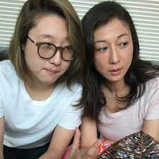 Etta Ng Chok Lam with her mother