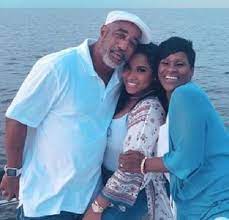 Toya Johnson with her parents
