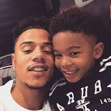 Lil Fizz with his son