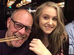 Alton Brown with his daughter