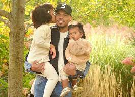 Chance The Rapper with his daughters