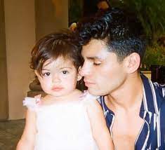 Ryan Garcia with his daughter