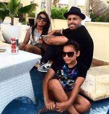 Nicky Jam with his daughters