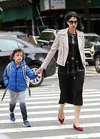 Huma Abedin with her son