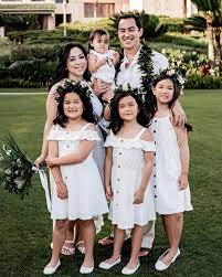 Judy Travis with her husband & kids