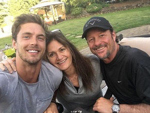 Christian Hogue with his father & mother